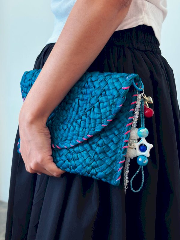 CLUTCH BAG WITH CHARMS