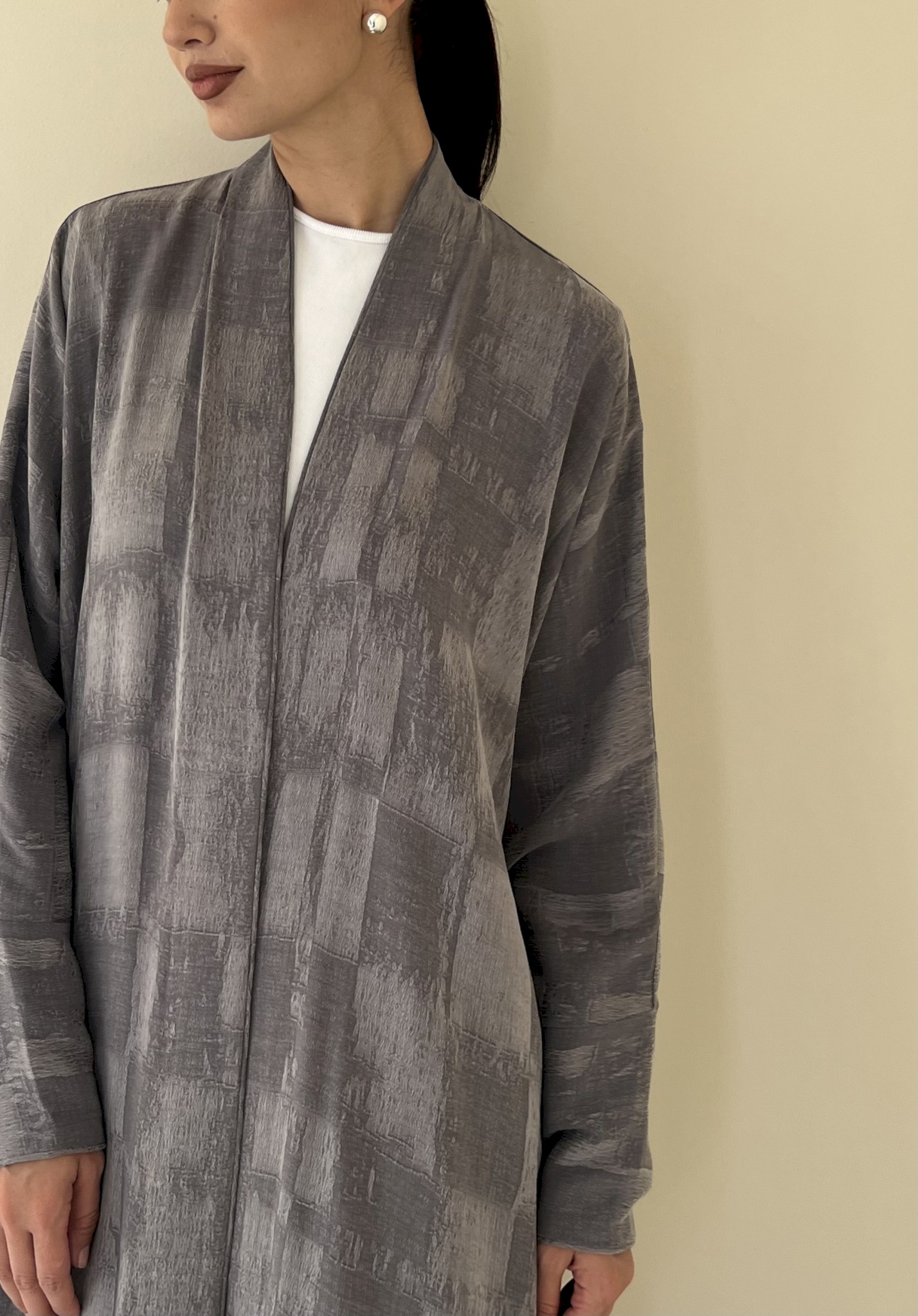 Grey textured grid cloak