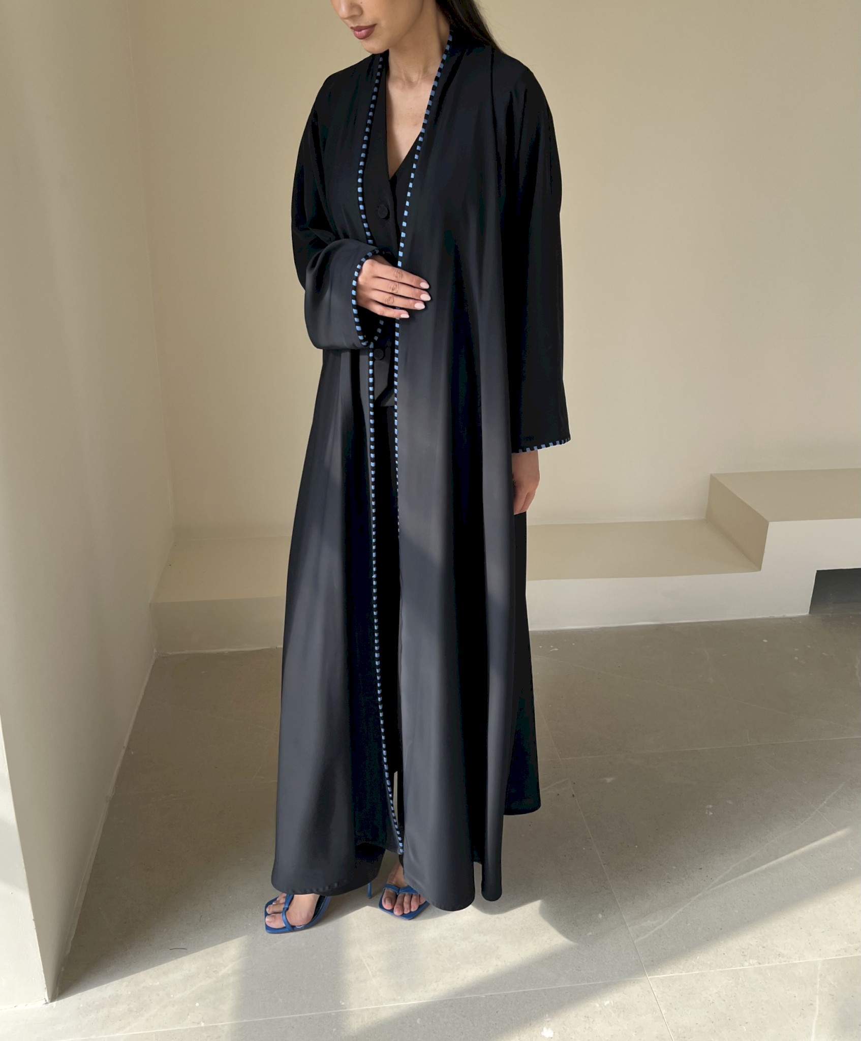 Black two-tone piping cloak