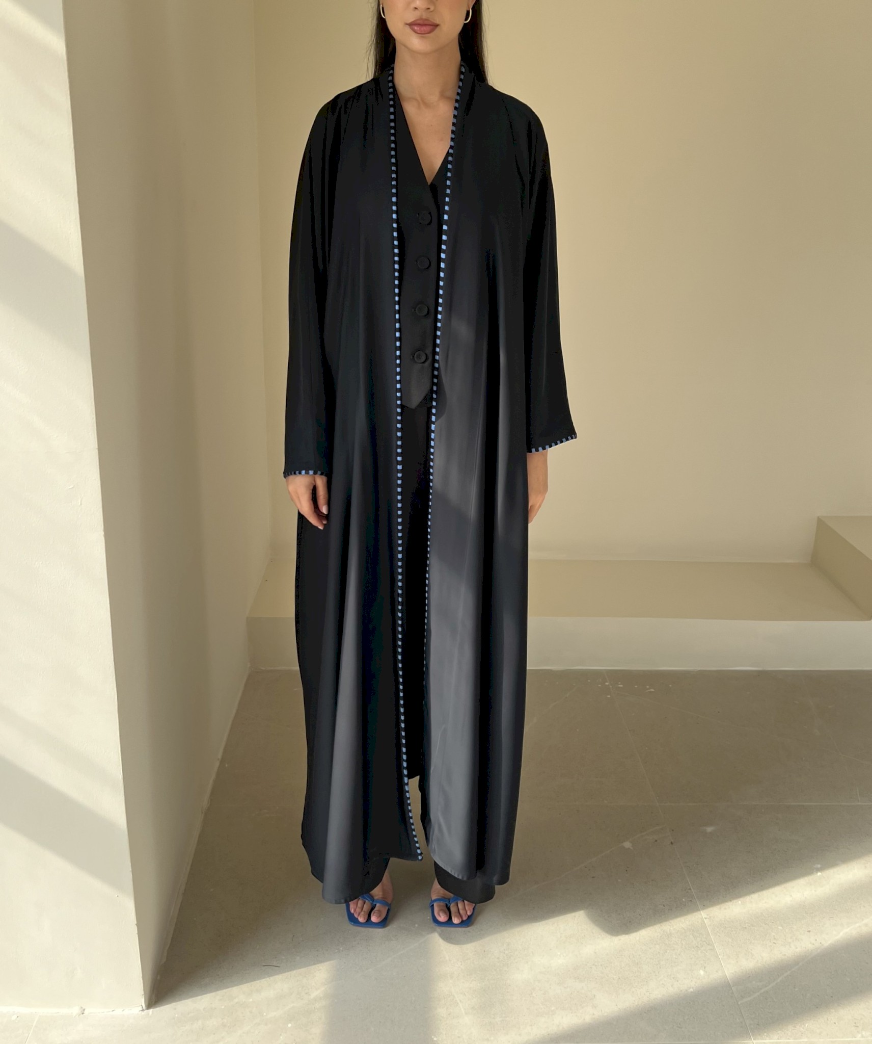 Black two-tone piping cloak
