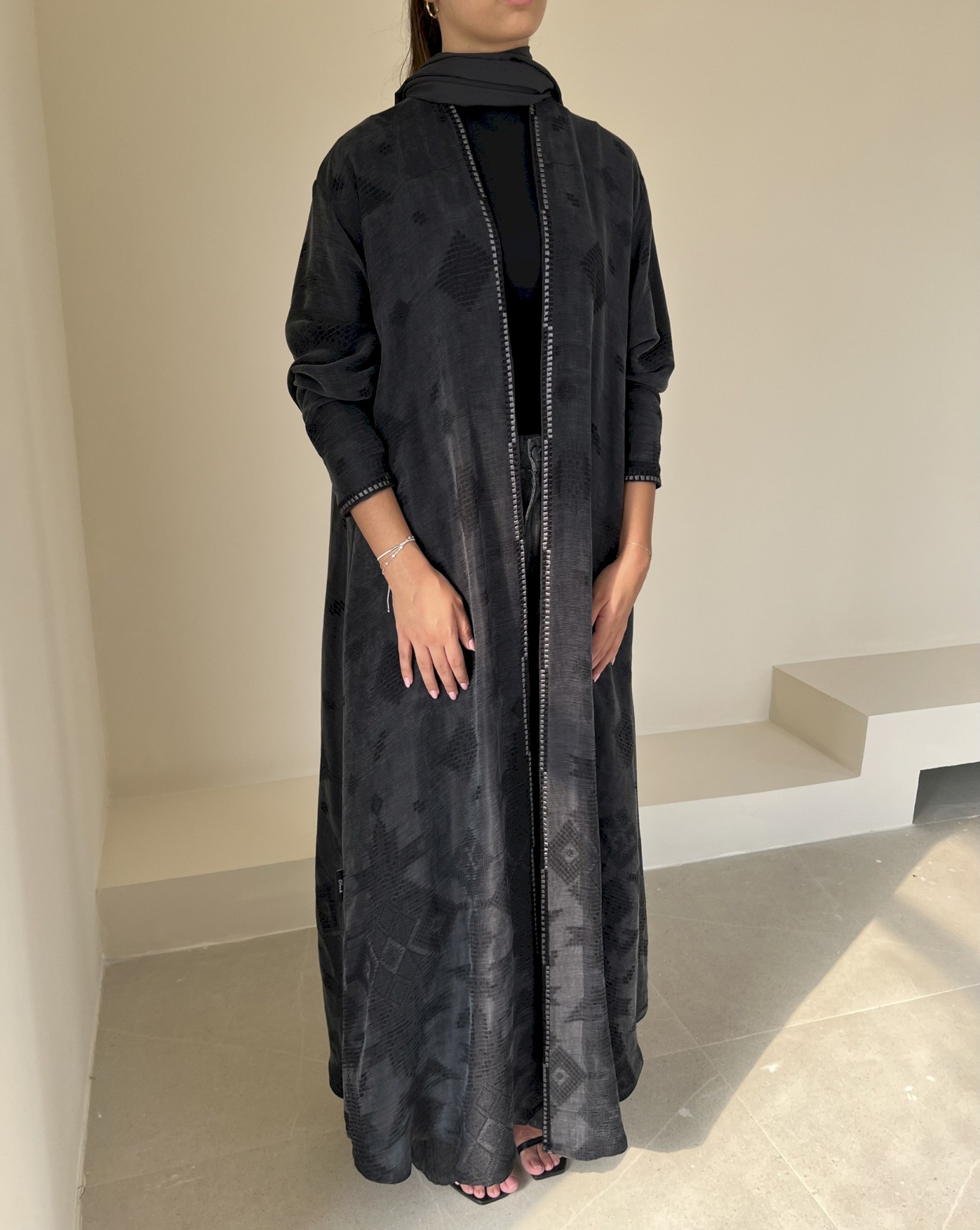 Smoky black sadu-inspired cloak